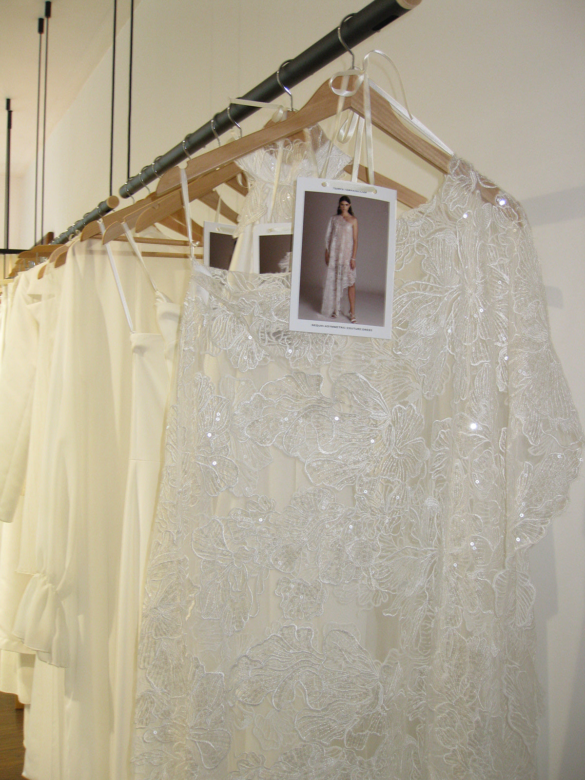 Wedding Dresses on Hangers at TEMPÊTE Bridal Boutique in Vancouver