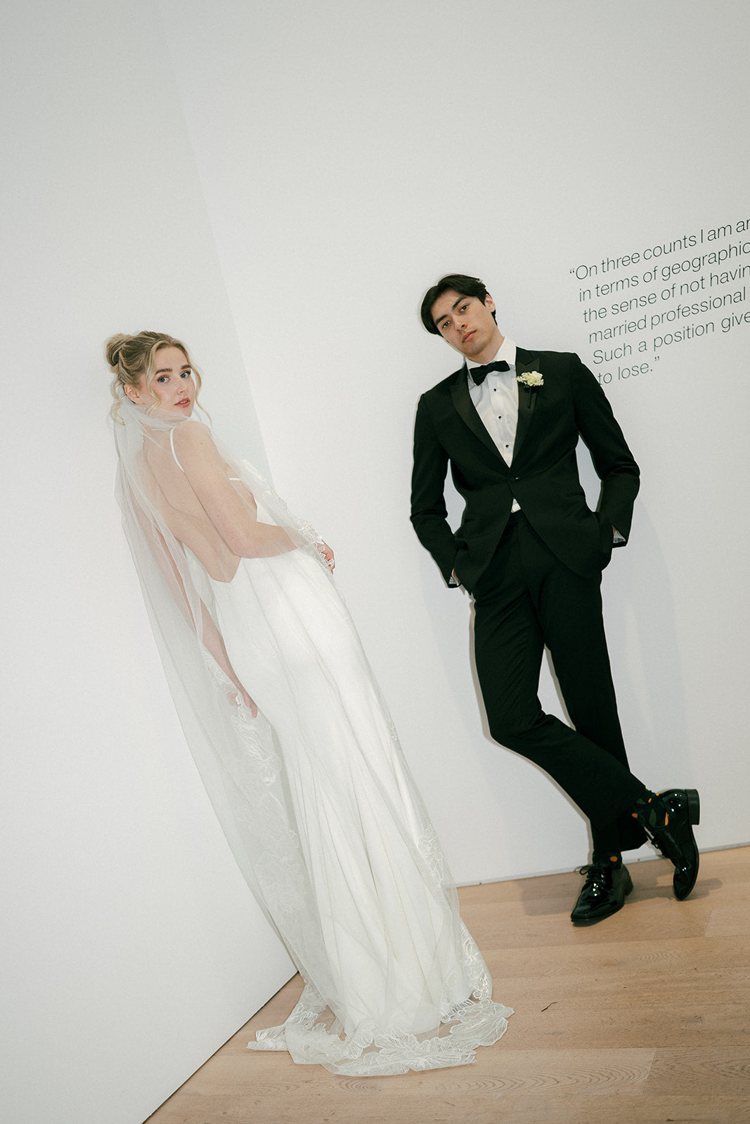 Bride is wearing cathedral minimalist veil