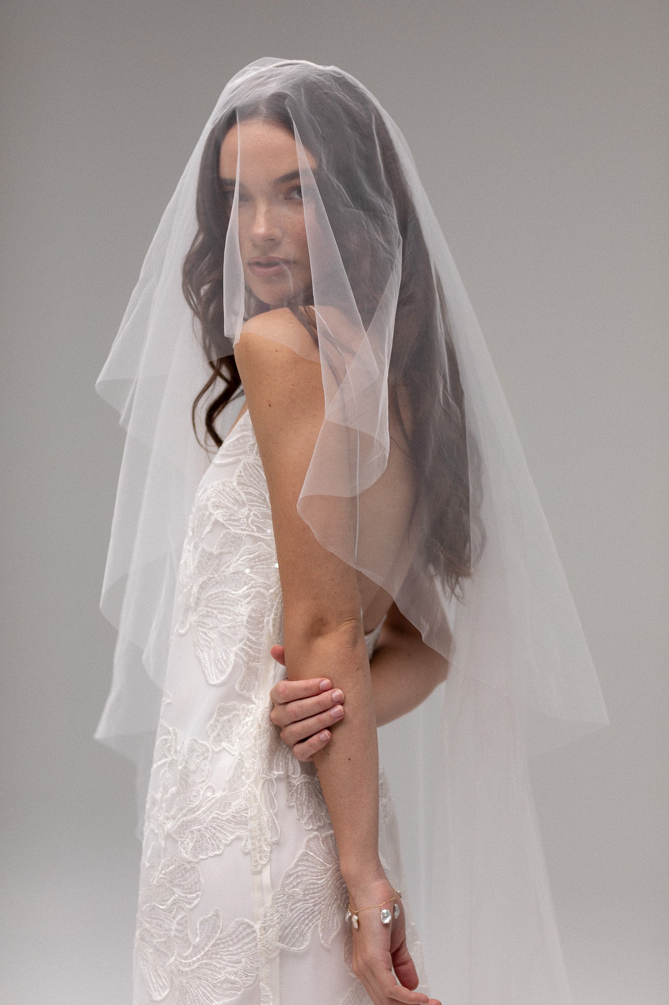 Modern bridal veils featuring delicate tulle, sequin embellishments, and timeless designs for a fashion-forward look.