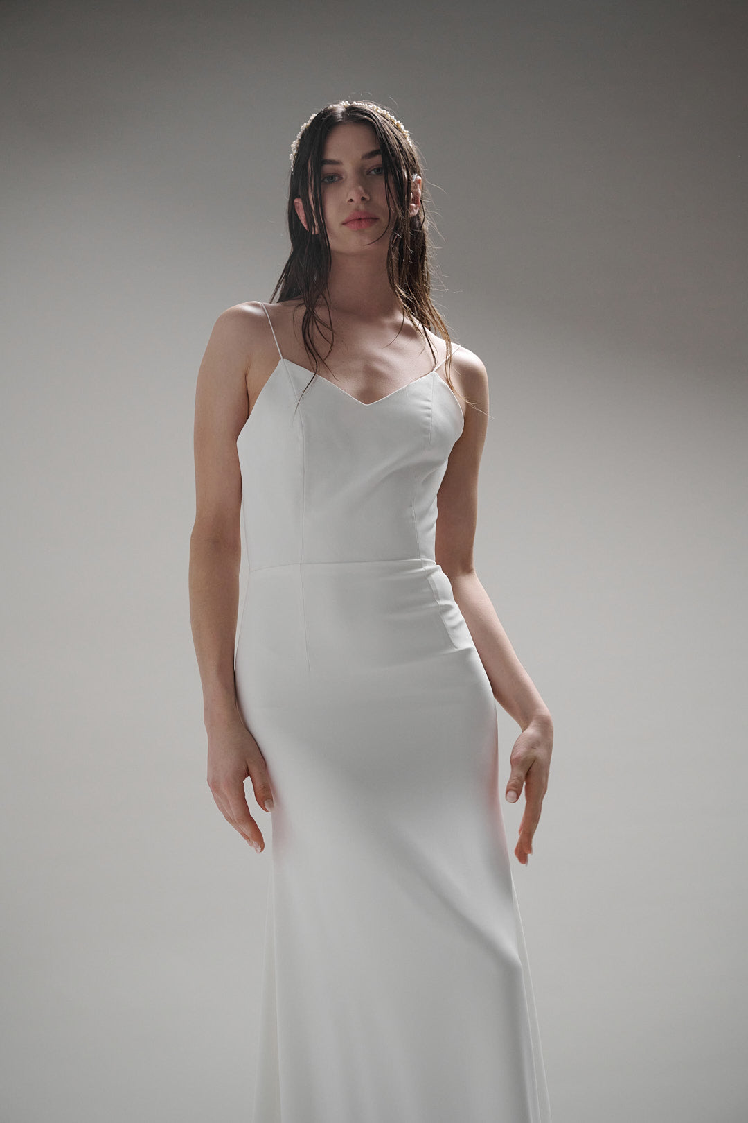 The Loire dress offers a timeless look of sophistication, perfect for a bride seeking an effortless yet elegant look.