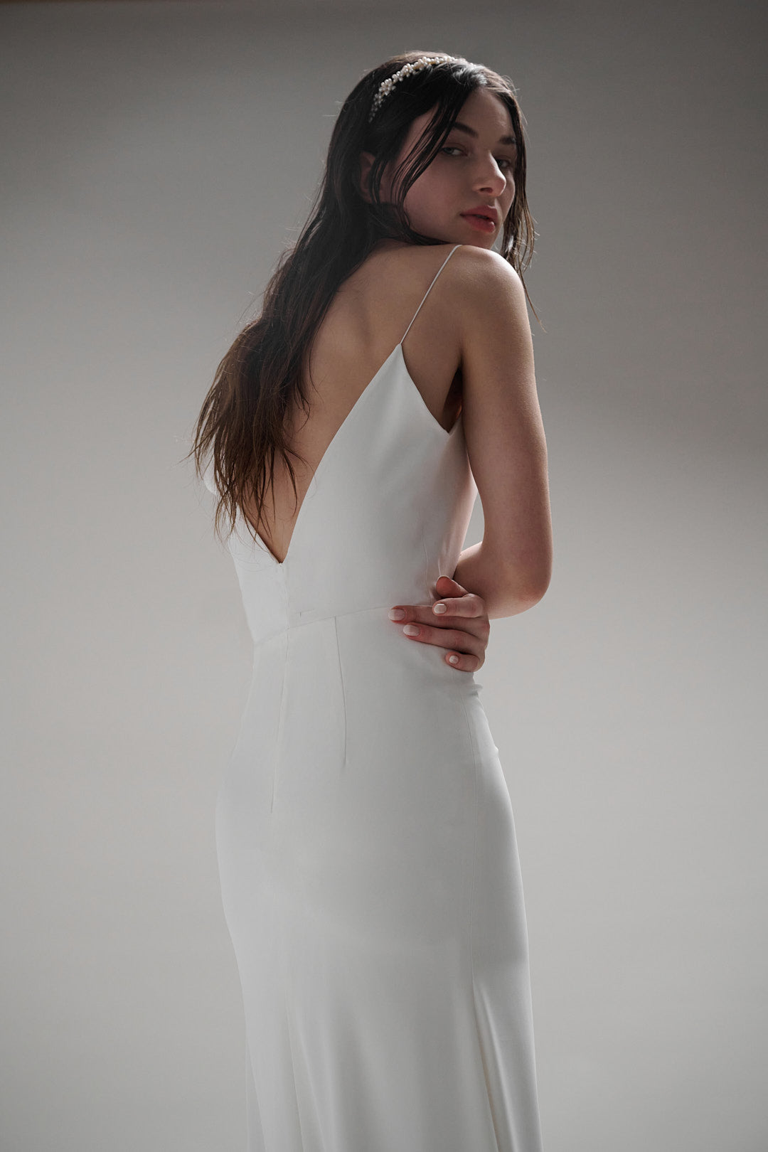 The Loire dress offers a timeless look of sophistication, perfect for a bride seeking an effortless yet elegant look.