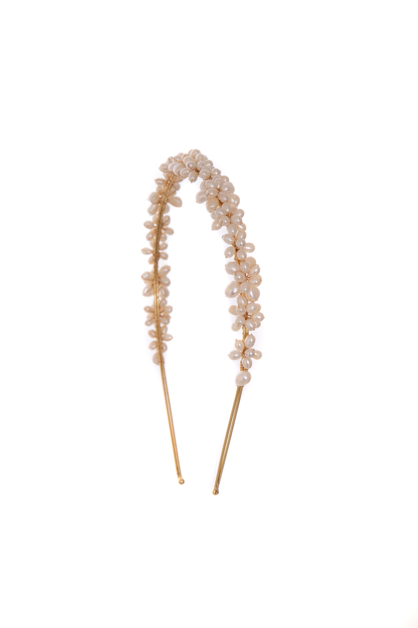 Sophisticated and dreamy pearl headband will compliment any bridal look. Look like a goddess walking down the aisle with light shimmering off each individual pearl.