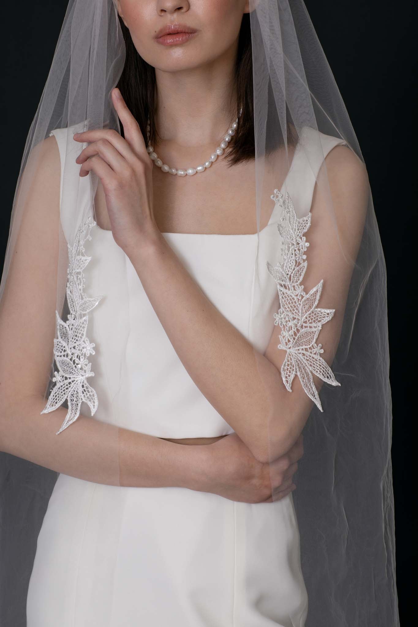 Laurie Floral Veil with leaf trim detailing on a soft tulle by TEMPÊTE bridal fashion brand