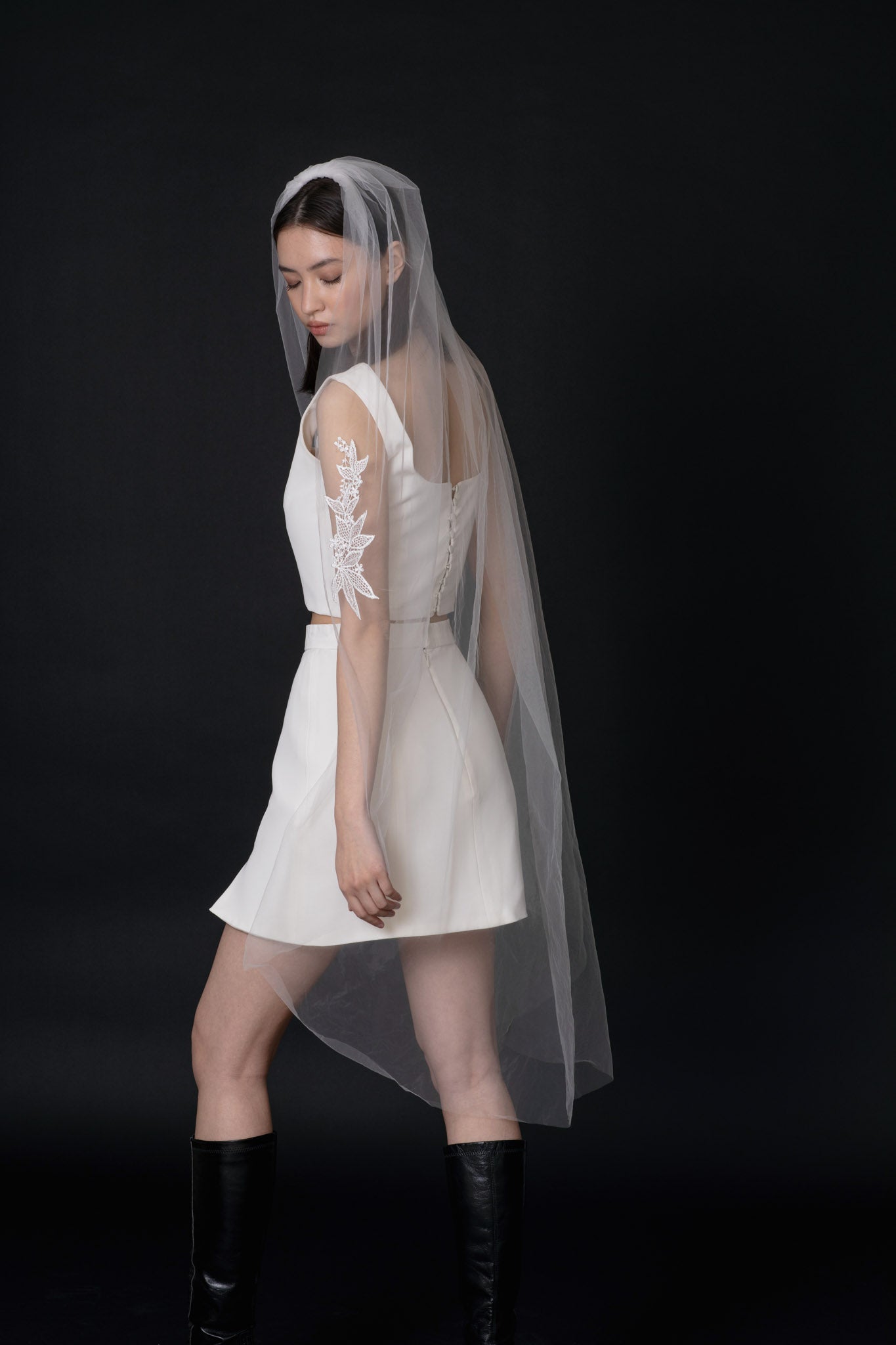 Back of Laurie Floral Veil with leaf trim detailing on a soft tulle by TEMPÊTE bridal fashion brand